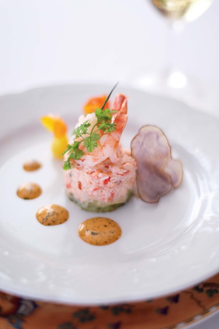 A lobster salad starts off an elegant meal aboard the Crystal Serenity.