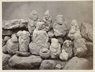 Sacrifical place with eight ancestor sculptures, some holding a child. Mount Aki0aki, Kuningan district, West Java province, 14th-16th century.