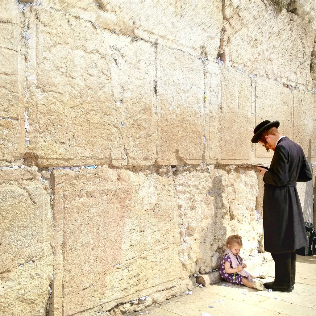 wall-man-Jerusalem - In Judaism, the Western Wall in Jerusalem is venerated as the sole remnant of the Holy Temple.