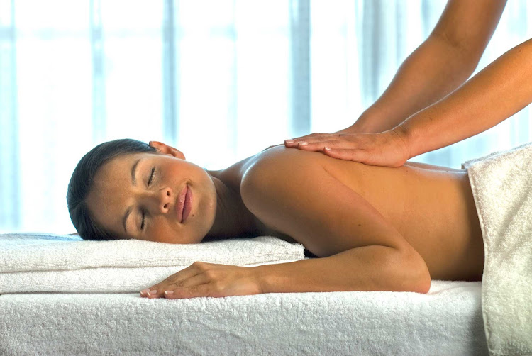 A massage from a trained masseuse at Voyager of the Seas' full-service Vitality Spa can revitalize the mind and body.