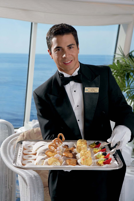 Teatime waiters provide light treats on Crystal Symphony.