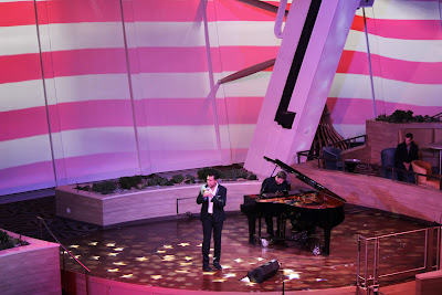 Two70, the future of cruise ship entertainment venues, is truly unique. The room is a mixture of your traditional cruise ship theater with the comfort and exclusivity of a smaller lounge. Plus, the aft windows quickly transform into a panoramic visual screen for a multitude of shows and performances.