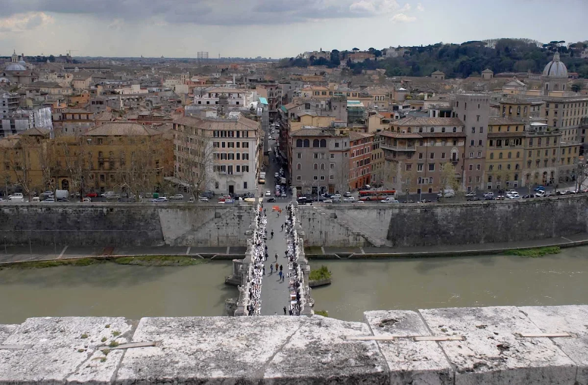 View-Castel-Sant'Angelo-Rome - Looking down on the Ponte Sant'Angelo and the Tiber River from the top of Castel Sant'Angelo, Campo Marzio, Rome.
