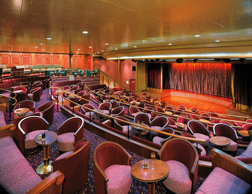 Silversea_theater-1 - The plush theater aboard Silver Shadow is big enough for Broadway-style shows. Performances take place daily.