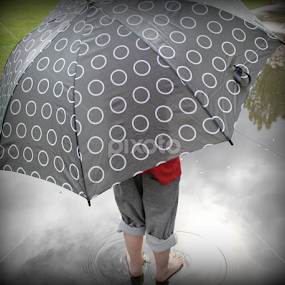grandson in the rain by Yvonne Delahaye - Babies & Children Children Candids