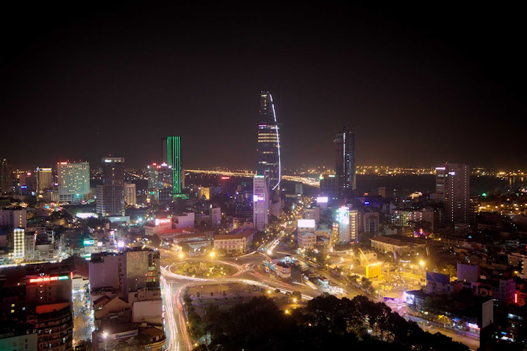 The skyline of Ho Chi Minh City, Vietnam, at night.