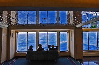 Watching  waves fill the ship's windows while crossing the Drake Passage.