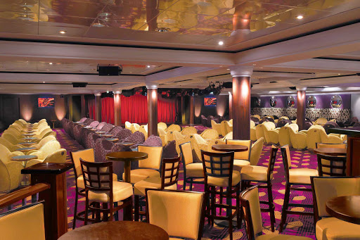 Norwegian-Star-Spinnaker-Lounge - Put on those dancing shoes after drinking a cocktail or two in Norwegian Star's festive Spinnaker Lounge.