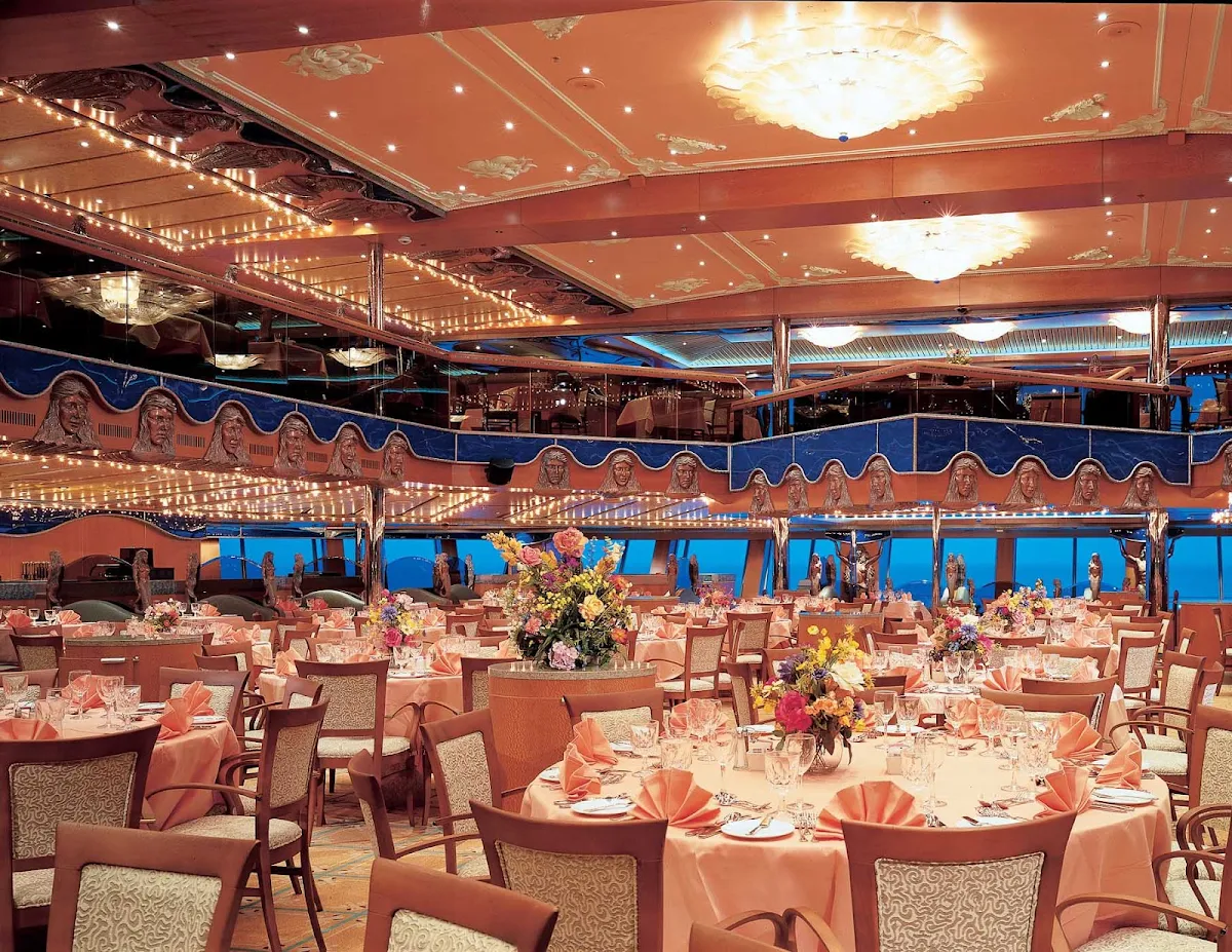 Carnival-Victory-Pacific-Restaurant - When at sea, the two-level Pacific Restaurant, one of Carnival Victory's main dining halls, serves breakfast, lunch and dinner.