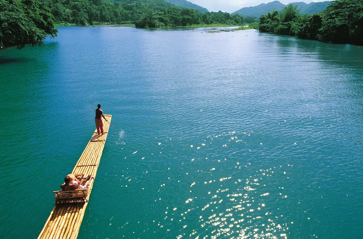 guided-raft-tour-Jamaica - A guide takes guests on a scenic tour of one of Jamaica's inland waterways. 