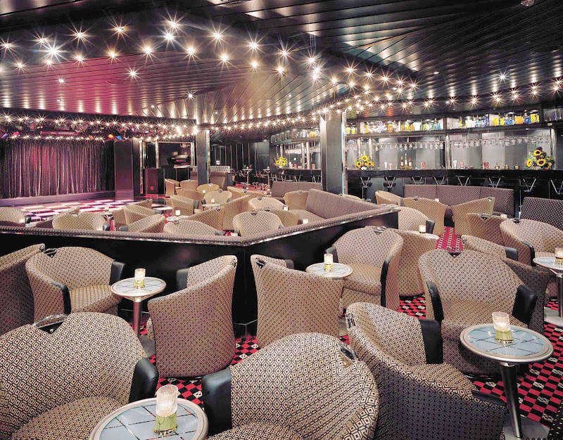 Be entertained with cabaret performances while drinking and dining at Norwegian Sky's Dazzles Nightclub.