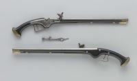 Pair of wheellock pistols with spanner