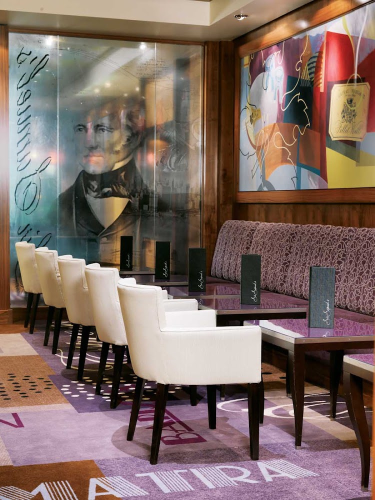 Try a glass of fine wine or a cappuccino and fresh baked pastries at Sir Samuel's wine bar aboard Queen Mary 2.
