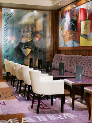 Try a glass of fine wine or a cappuccino and fresh baked pastries at Sir Samuel's wine bar aboard Queen Mary 2.