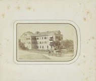 Exterieur van Hotel Nelboeck in Salzburg met een paardenkoets ervoor