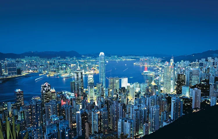 A view of Hong Kong and the harbor from Victoria Peak at night. 