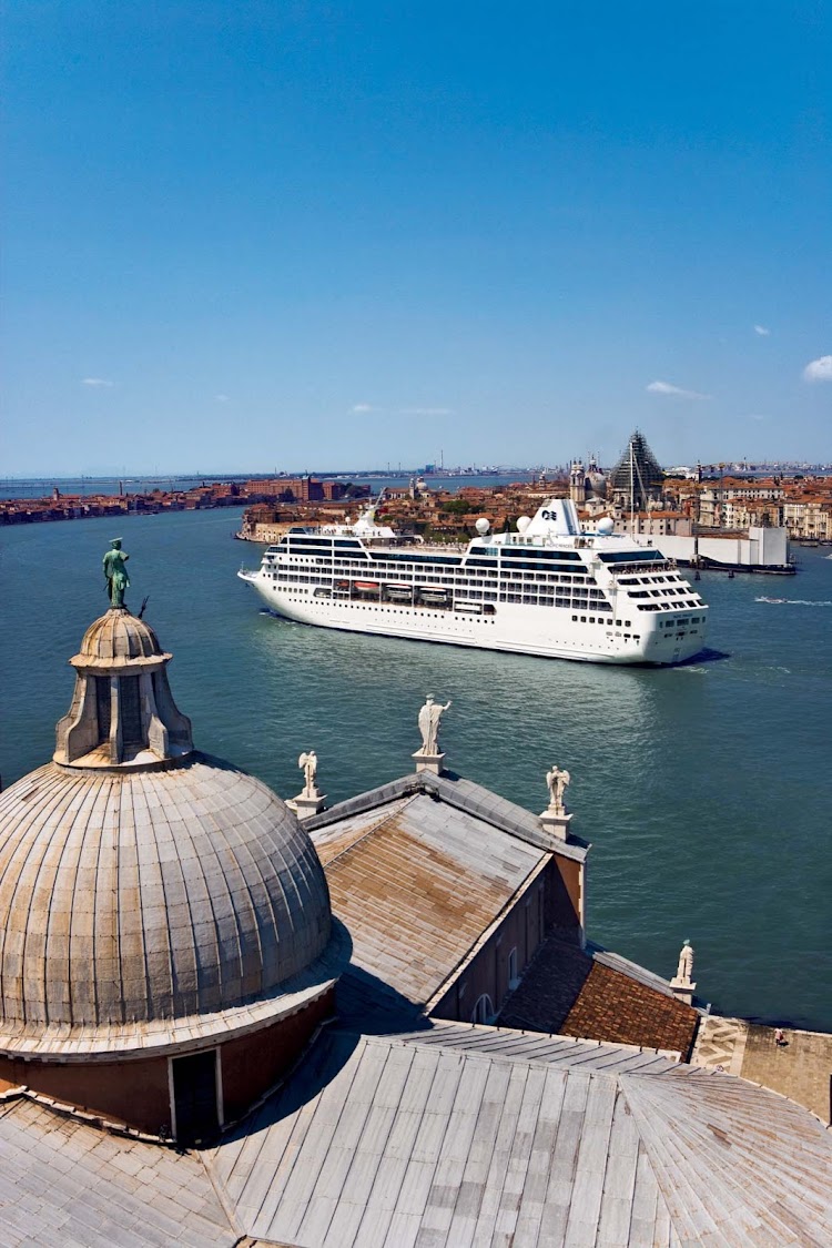 Pacific Princess sails through the heart of Venice, Italy, before mooring to give passengers a day to explore the world capital of romance. 