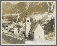 Gebombardeerd dorp met een kerk en een kerkhof in de Dolomieten
