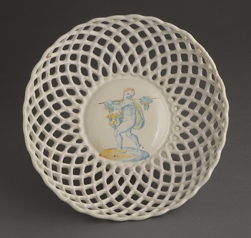 Cup with fretwork decoration of a young fowler