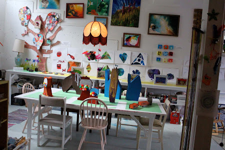 A look into the studio at the art, all set up for the parents to come see. 