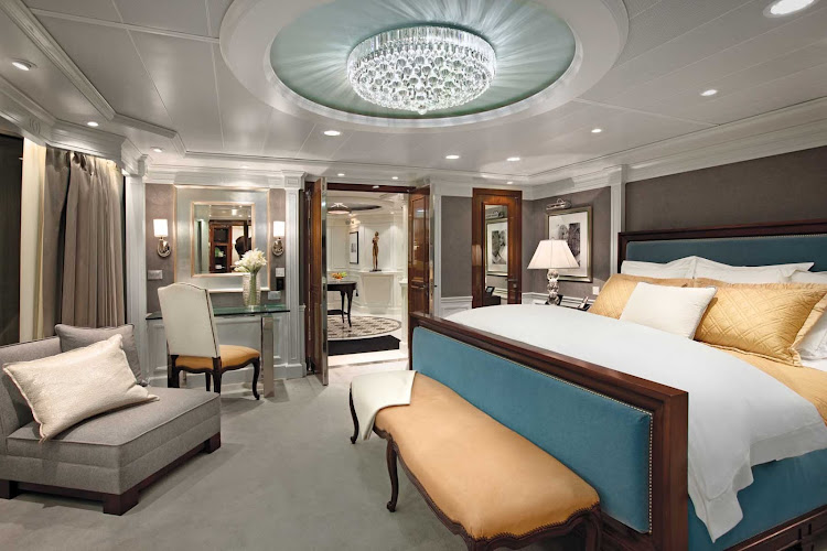 Sail in grand style: A look at the bedroom and its stylish light fixture inside the Owners Suite of Oceania Marina.