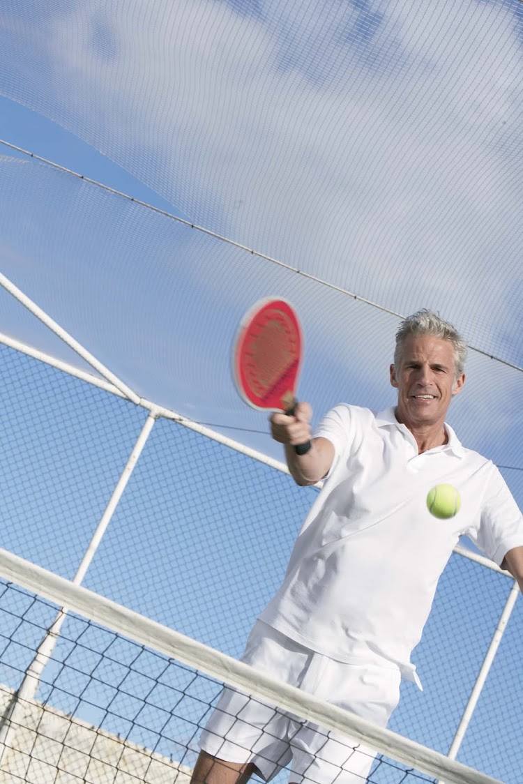 Enjoy a rousing game of paddle tennis aboard the Crystal Symphony.