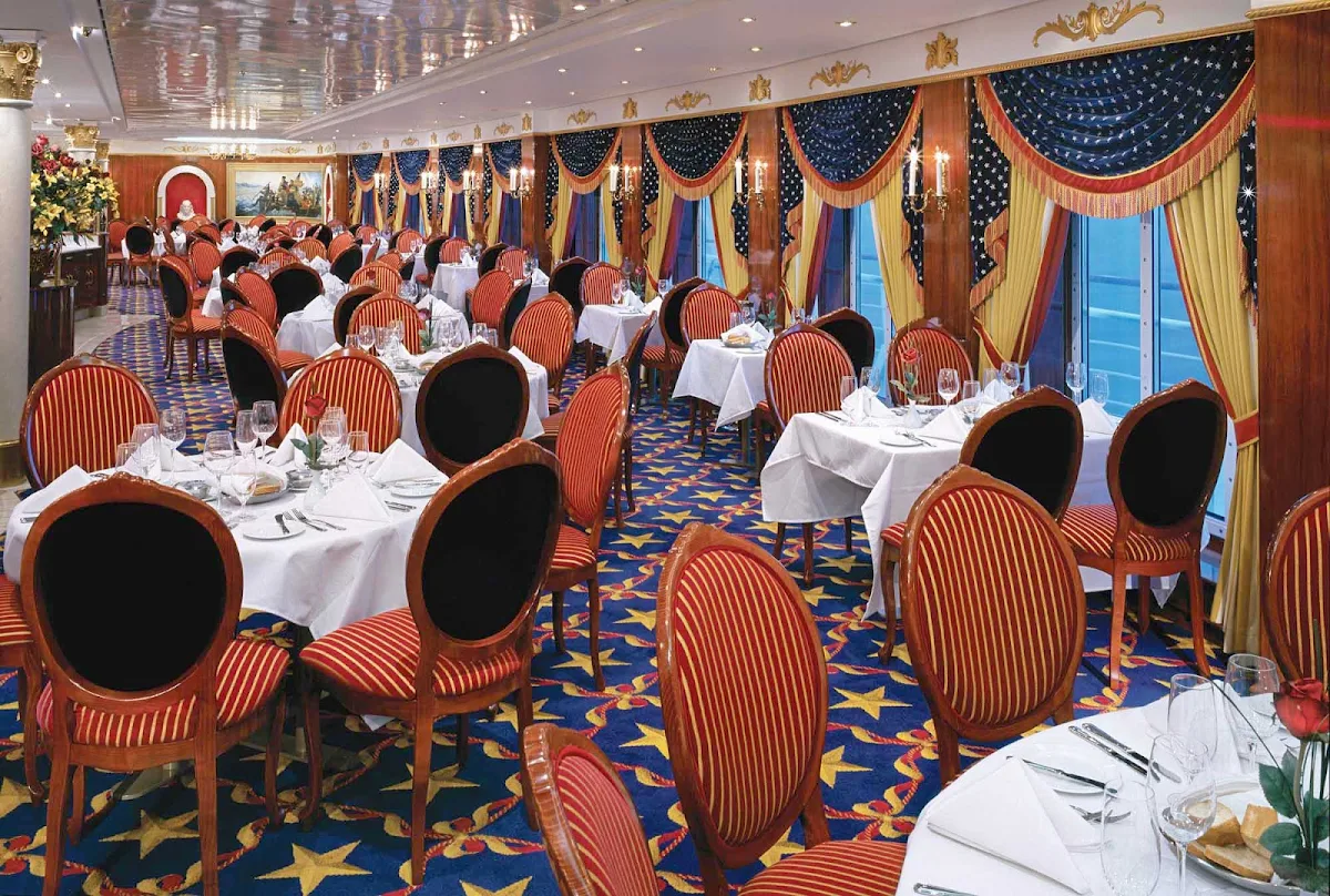 Norwegian-Pride-Of-America-Dining-Liberty - The Liberty Main Dining Room aboard Norwegian Cruise Line's  Pride of America features American Colonial-inspired furniture and accents.