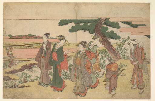 Travelers pausing beside a rice field