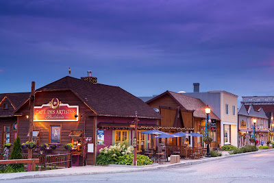 Cafe Des Artists along Rue de la Reine in Gaspesie, at the mouth of the St. Lawrence River in Quebec.