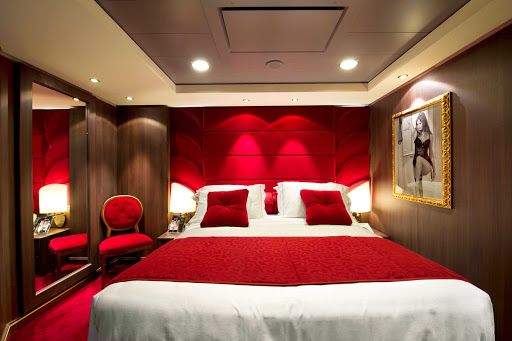 The rich velvet fabrics and elegant décor of the Sophia Loren Royal Suite is sure to impress Yacht Club members who book the stateroom aboard MSC Divina.