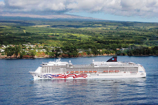 Norwegian  Norwegian Cruise Line's Pride of America sailing along the Hawaii coastline.