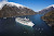 Sail down Alaska's Tracy Arm Fjord between ice-capped glaciers during a summmer cruise aboard Celebrity Solstice.
