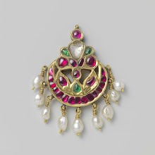 Pair of Earrings and Two Hair Ornaments