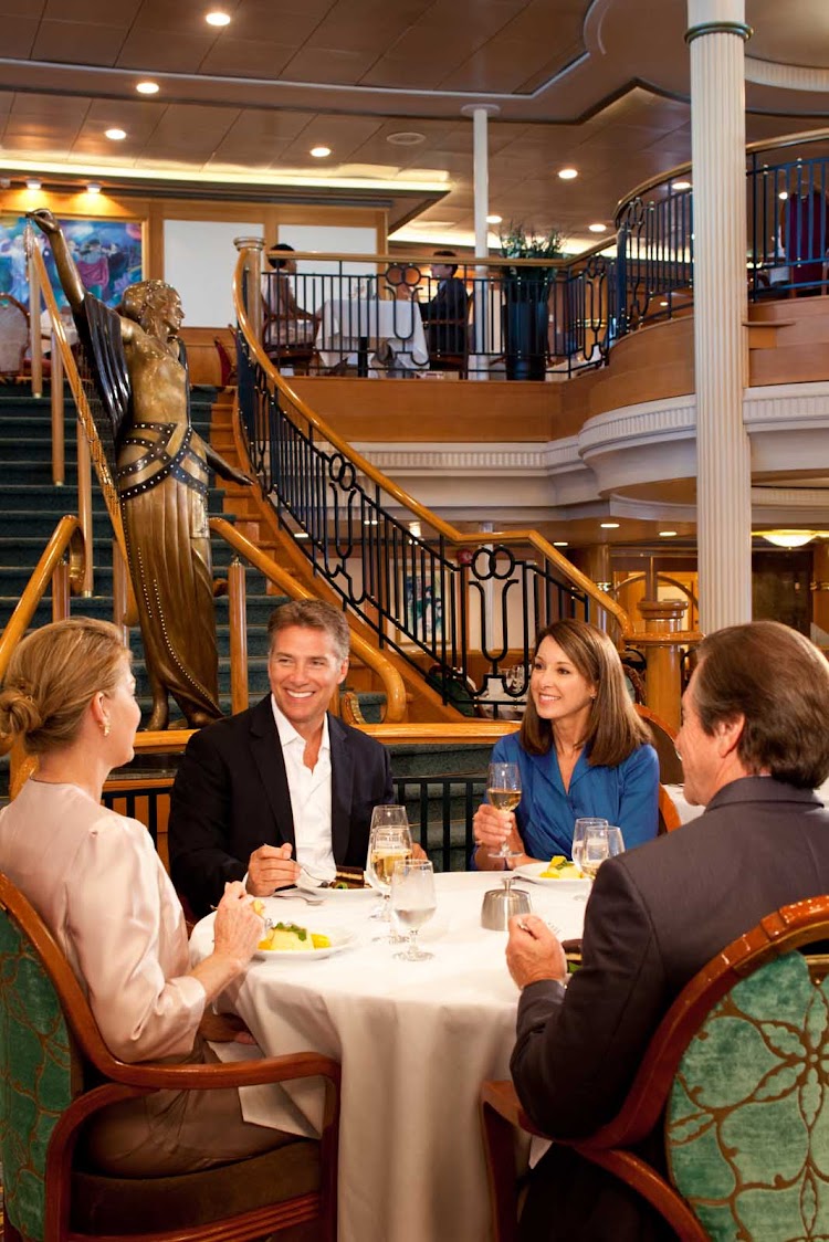 Dine in luxury in Grandeur of the Seas' two-level Great Gatsby dining room.
