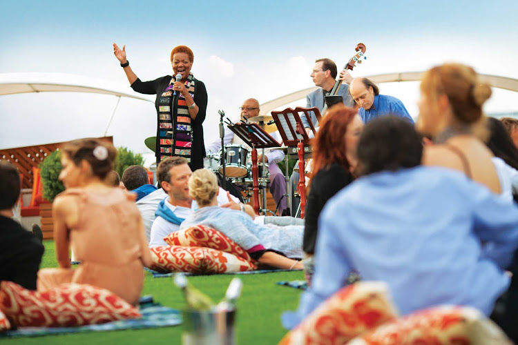 Lay down a blanket, relax with a glass of wine and listen to live music at Celebrity Silhouette's Lawn Bowls green.