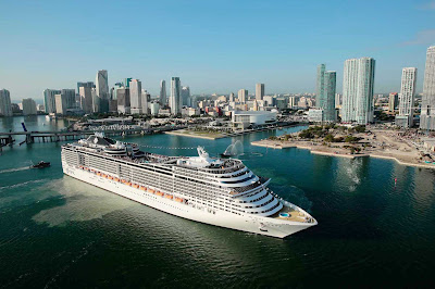 Enjoy a memorable vacation aboard the impressive MSC Divina, shown here against the Miami skyline. 