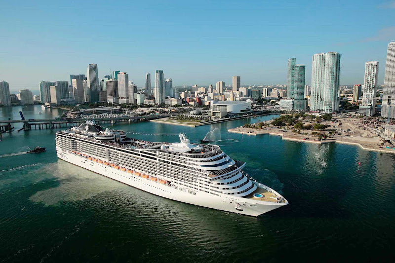 Enjoy a memorable vacation aboard the impressive MSC Divina, shown here against the Miami skyline. 