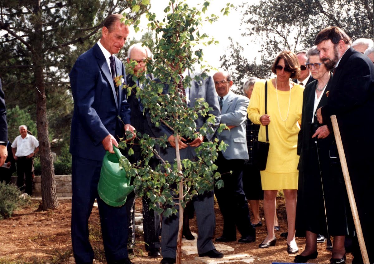 Prince Philip of England planting a tree in honor of his mother Princess Alice of Greece, 31 October 1994