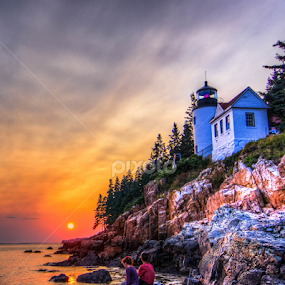 Bass Harbor Head Lighthouse Couple by G. Stetson - Landscapes Sunsets & Sunrises ( lighthouse, golden hour, sunset, romantic couple, maine coast, rockscape )