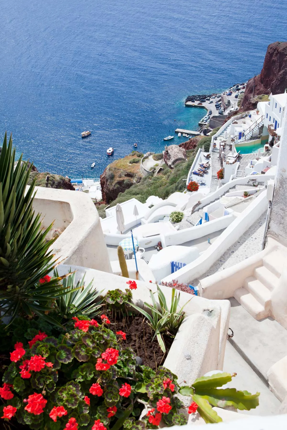 Regent-Seven-Seas-Fira-stairway - Perch atop a cliff in Fira, the capital of Santorini, and look down at sugar cube houses and a labyrinthe of walkways during your Mediterranean cruise aboard Seven Seas Mariner.