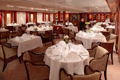 Enjoy elegant dining in the Dining Salon on a SeaDream cruise.