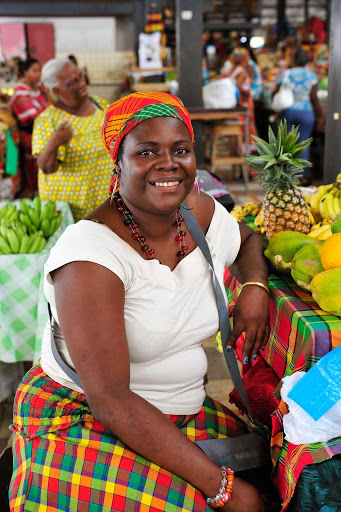 Lady-in-market-Martinique - A local resident visits local markets for fresh island fruit along Martinique's southern coast.