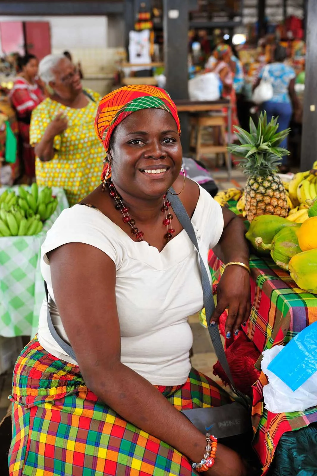 Lady-in-market-Martinique - A local resident visits local markets for fresh island fruit along Martinique's southern coast.