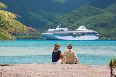 A couple relaxes during a shore excursion on a Paul Gauguin cruise.