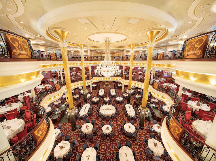 Mariner of the Seas' lovely three-story main dining room serves multi-course breakfasts, lunches and dinners.