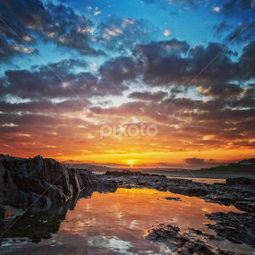 Sunset reflection by Adrian O'Neill - Landscapes Sunsets & Sunrises
