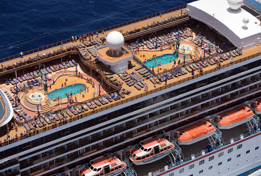 There's plenty of fun in the sun at Carnival Legend's two main swimming pools, the Camelot (left) and the Avalon.