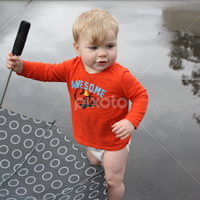 grandbaby in the rain by Yvonne Delahaye - Babies & Children Children Candids
