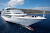 The Seabourn Quest crew poses on the bow of the ship. 