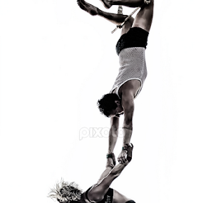 Acrobats by Jim Merchant - People Musicians & Entertainers